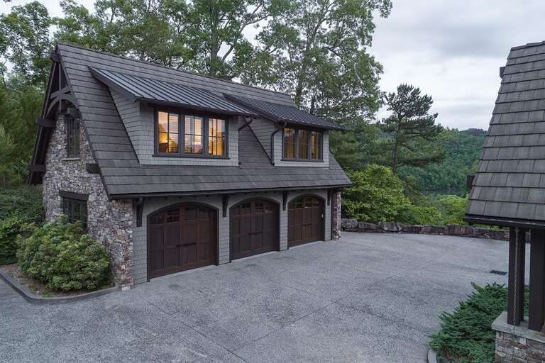 garage with guest house above