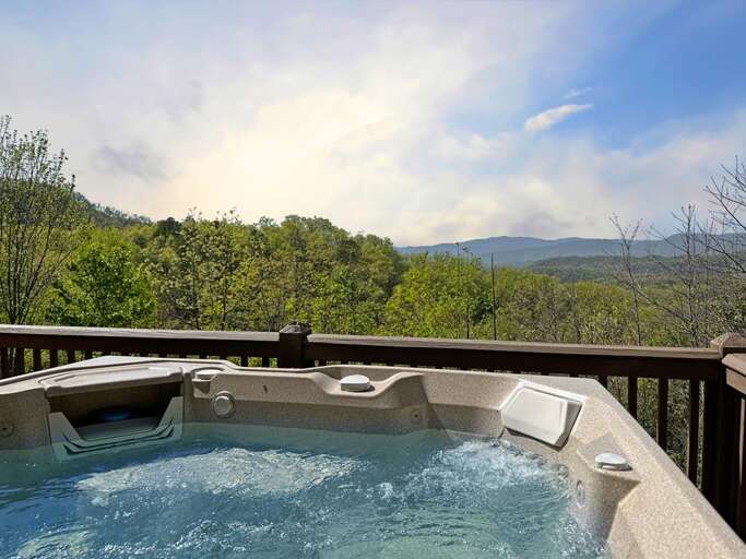 relax in the hot tub with view of Clingman's Dome