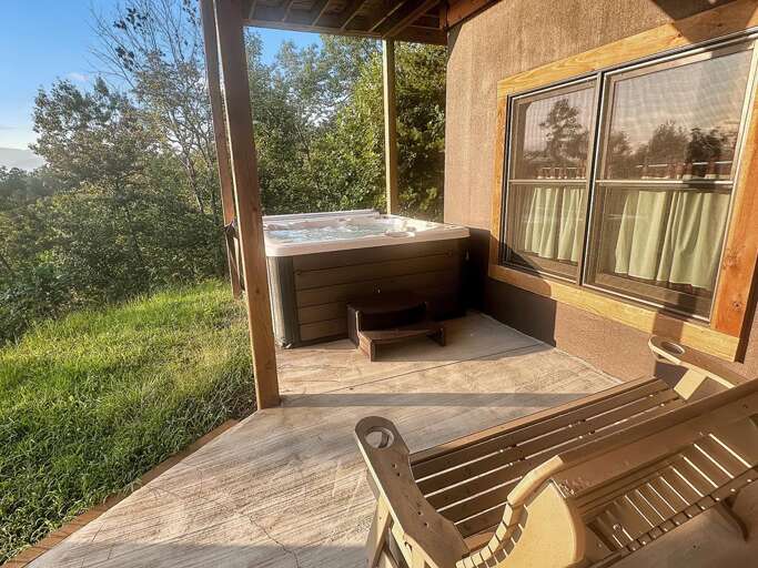 lower porch with hot tub