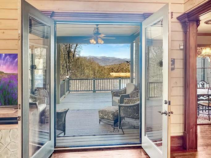 Trails End - great room out to porch lake view Trails End - great room out to porch lake view