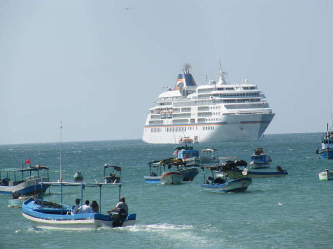 Beach scene with cruise ship at San Juan del Sur