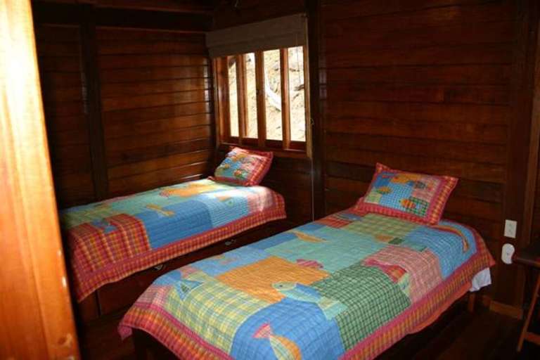 Bedroom by master with full bath, two twins & trundle bed