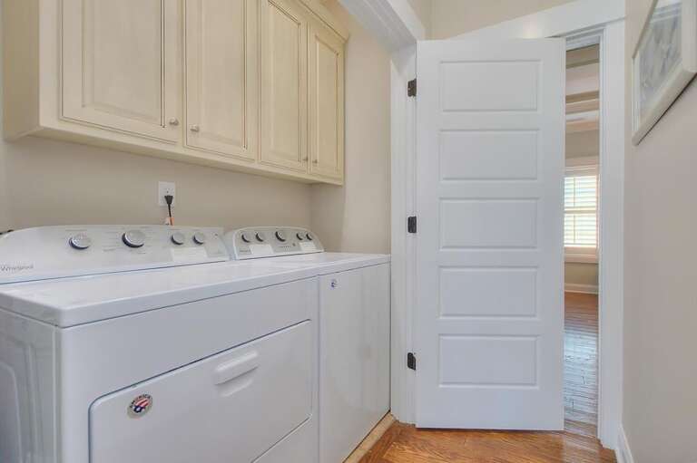 Laundry room with full sized washer and dryer
GW 12.2022