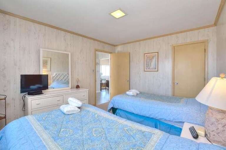 Blue room 2 twin beds, TV and Dresser
