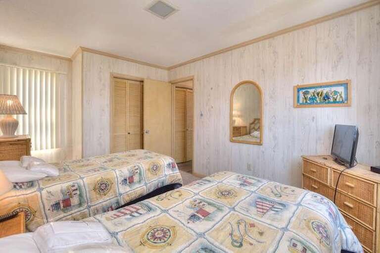 Light house room 2 twin beds and TV