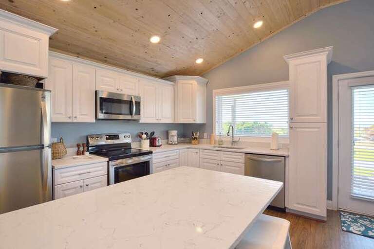 7702 E Beach Dr Oak Island NC-small-011-16-DSC 4693 4 5 Enhancer-666x444-72dpi