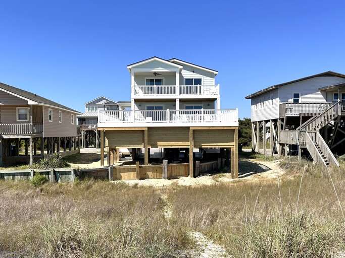 Back of home showing pool deck from ocean
4/23/24 JR