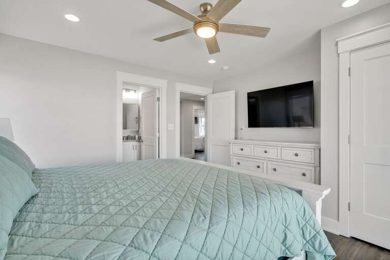 Teal King Bed with TV and Dresser
CG 2.2023