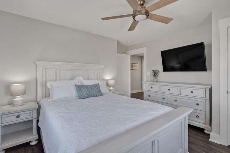 White with Teal Pillow Queen Bed with TV and Dresser
CG 2.2023