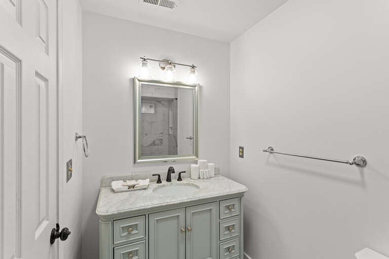 Turquoise Turtle Cottage Primary Bathroom Alt