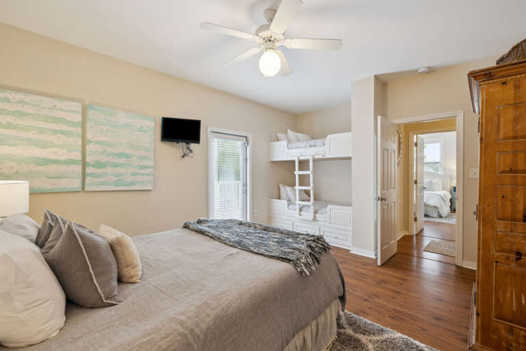 11-Queen-Guest-Suite-Equipped-with-a-Twin-Bunk-Balcony-Access