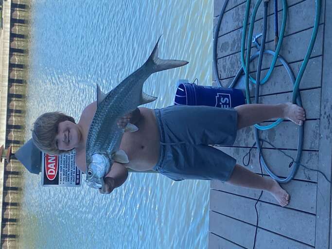 Nice tarpon caught right from the dock! 12.07.25
