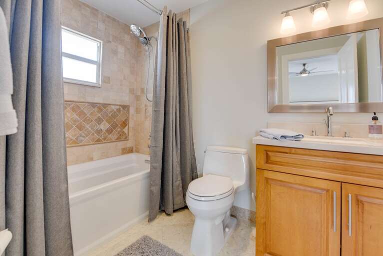 Bathroom With Tub, Toilet, And Sink Bathroom With Tub, Toilet, And Sink