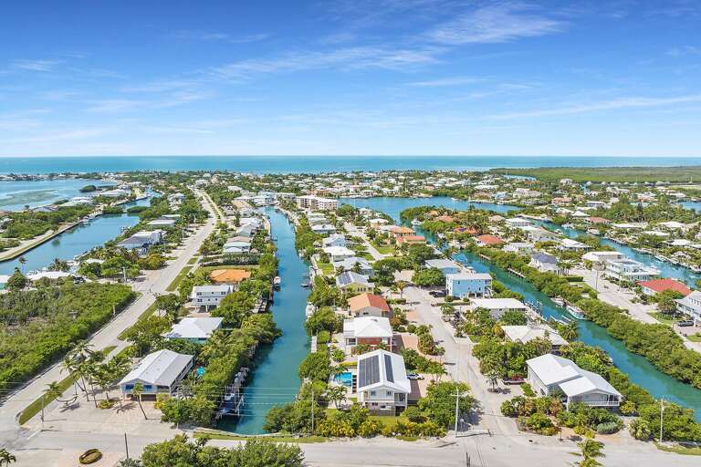 Aerial View Of Waterfront Residential Area With Canals