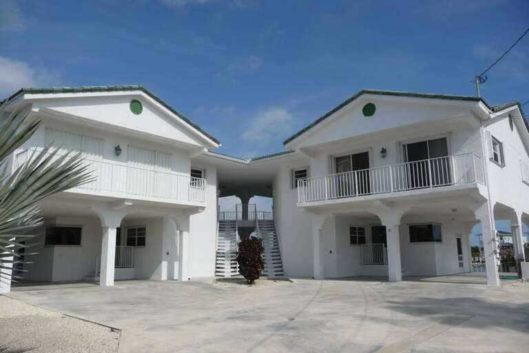 Building front, unit is on the right Building front, unit is on the right