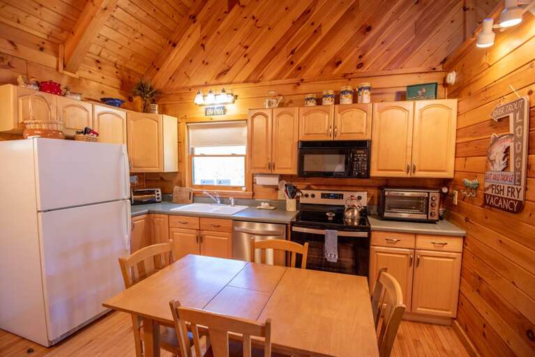 Eat-in kitchen with a 12-cup Mr. Coffee... Eat-in kitchen with a 12-cup Mr. Coffee...