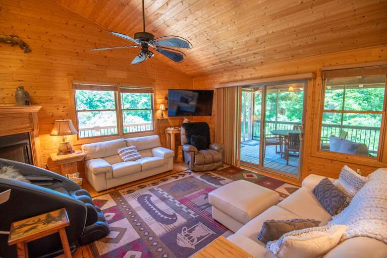 Big TV and plenty of seating choices...