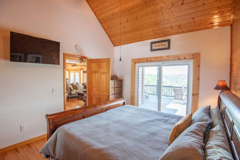 With Flatscreen TV and access onto deck...