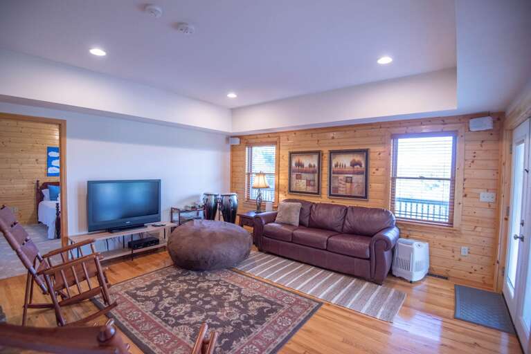 Lower level living area with TV...