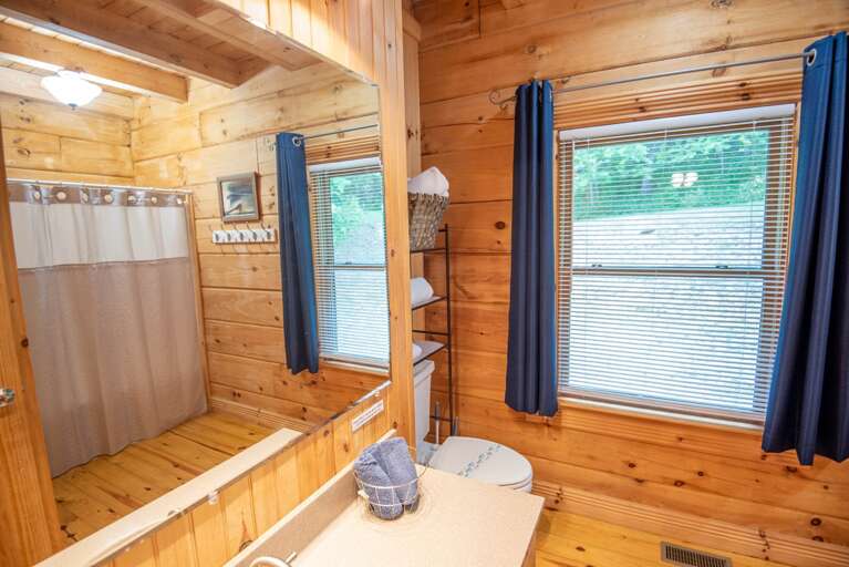 Full bathroom with shower/tub combo...