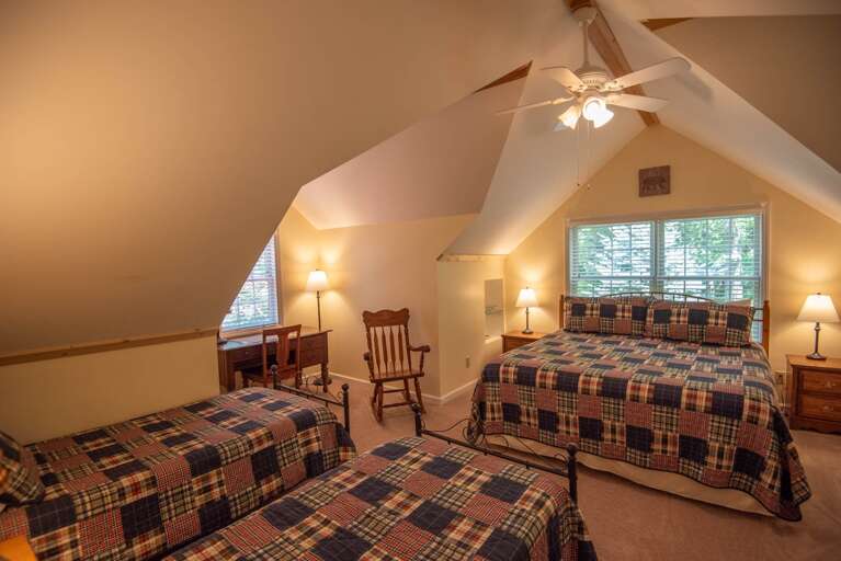 King bedroom with two singles...