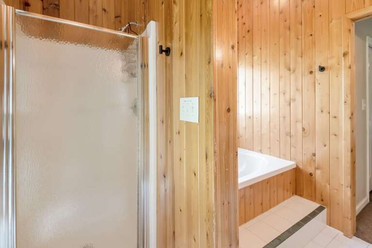 With walk in shower and soaking tub...