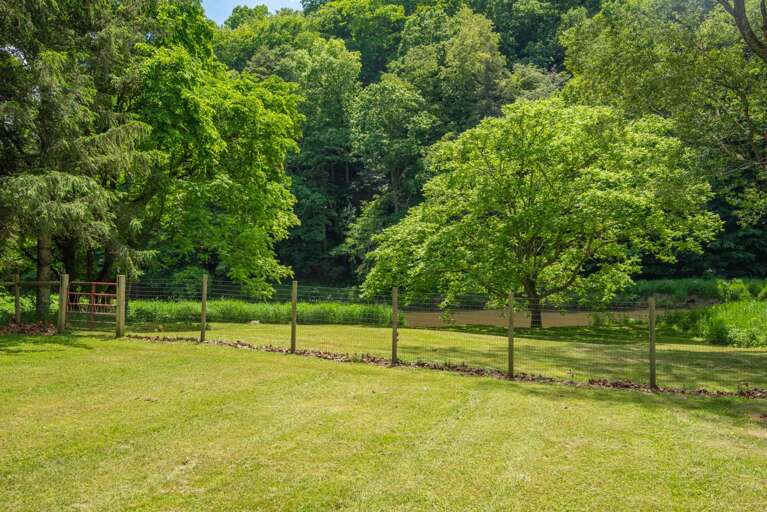 Well-kept yard overlooking the New River...