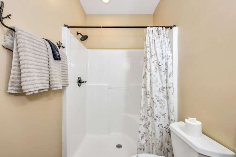 En suite bathroom with shower...