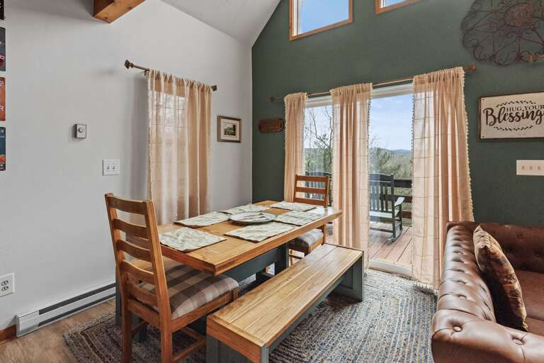 Dining room table with a view over the deck...
