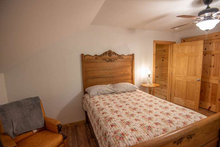 Queen bedroom with reading chair...