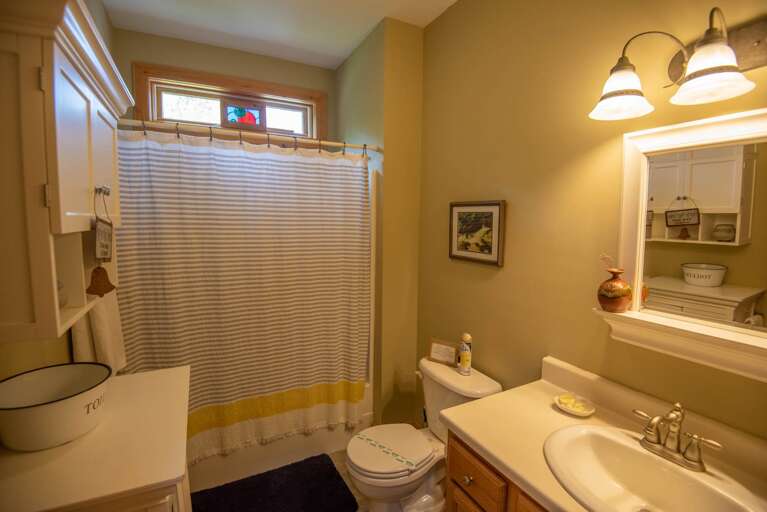 Full bathroom with tub/shower combo...
