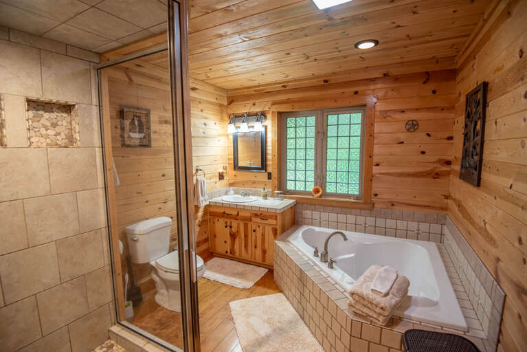 With shower and jetted tub...