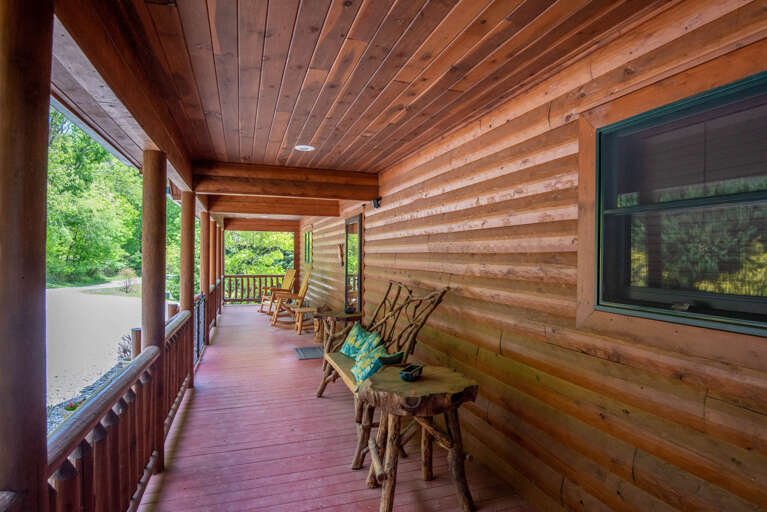 No cabin is complete without the covered porch and seating...