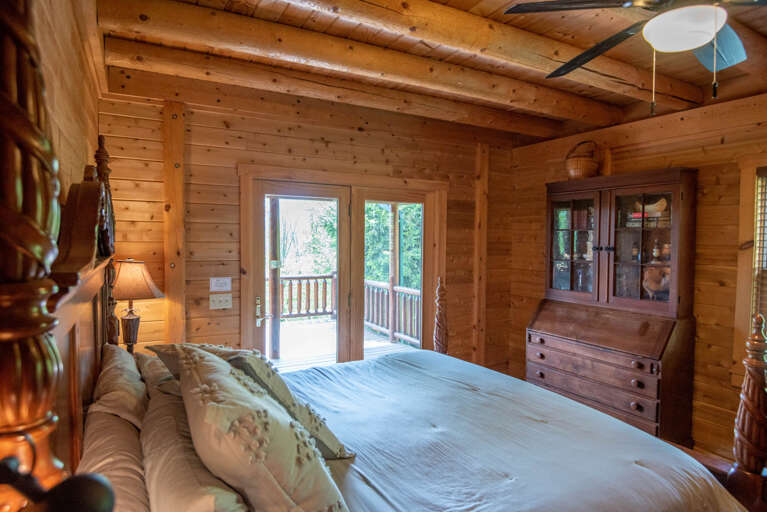 King bedroom with deck access...