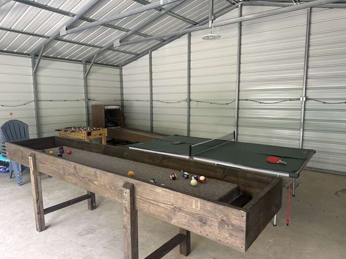 Ping pong, foosball, carpet ball, AND ski ball in the garage by river... Ping pong, foosball, carpet ball, AND ski ball in the garage by river...