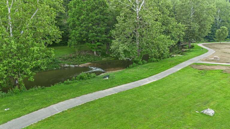 Walk along the creek in Downtown Lansing
