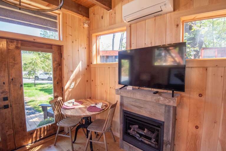 Dining space and mini-split unit will keep you warm or cool year-round... Dining space and mini-split unit will keep you warm or cool year-round...