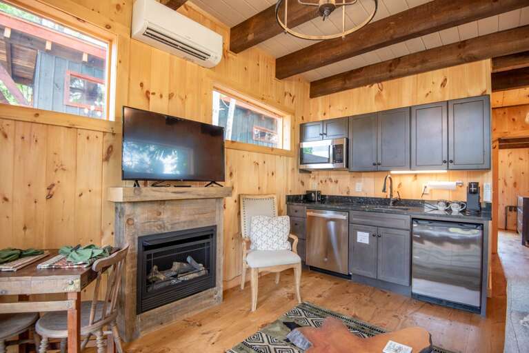 Fireplace, big screen TV...