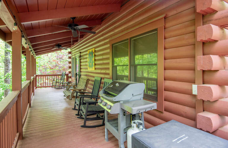 Covered front porch with gas grill...