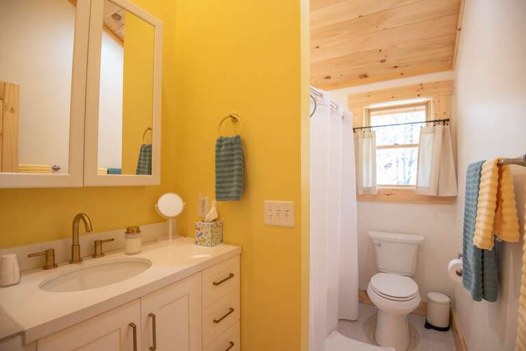 Upstairs shared bathroom with shower/tub combo...