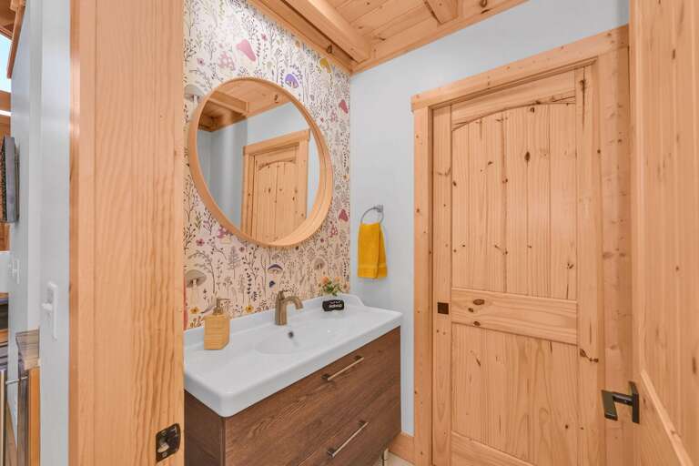 Half-bath off hall near living room
