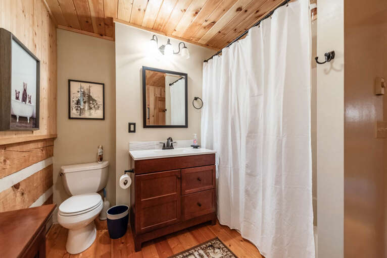 Shared upstairs bathroom with shower/tub combo...