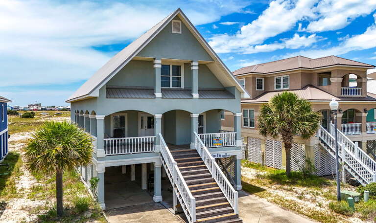 Beachfront Building Beneath Blue Skies