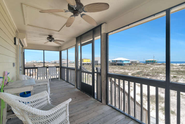 Balcony Beach View From Vacation Rental With Wicker Chairs Facing Sea Breeze