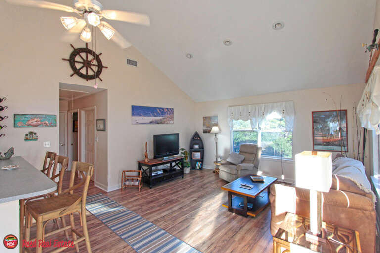 Bright, Breezy Vacation Rental Living Room With Maritime Motifs