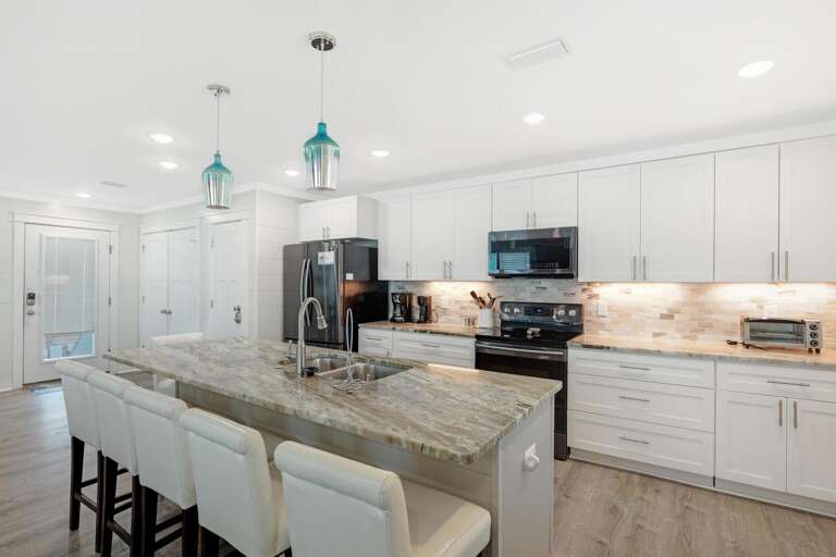 Fully Equipped kitchen with bar seating