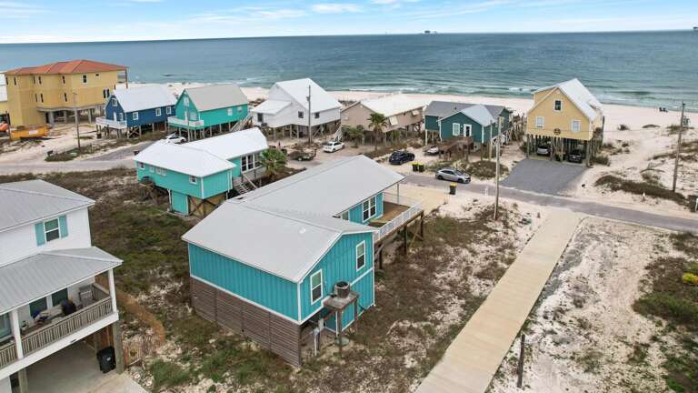 Located steps from the beach access