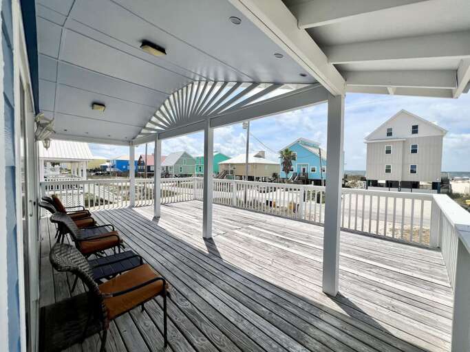 Beachside Boardwalk Balcony Overlooking Vibrant Village
