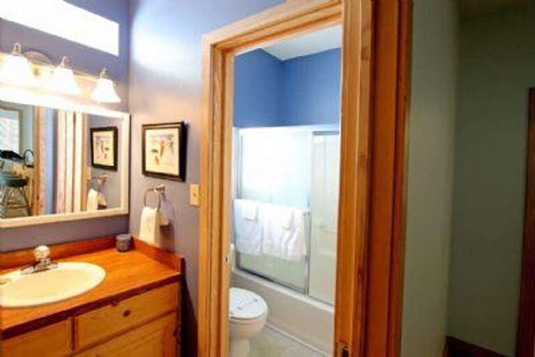 Common bathroom with separated sink area