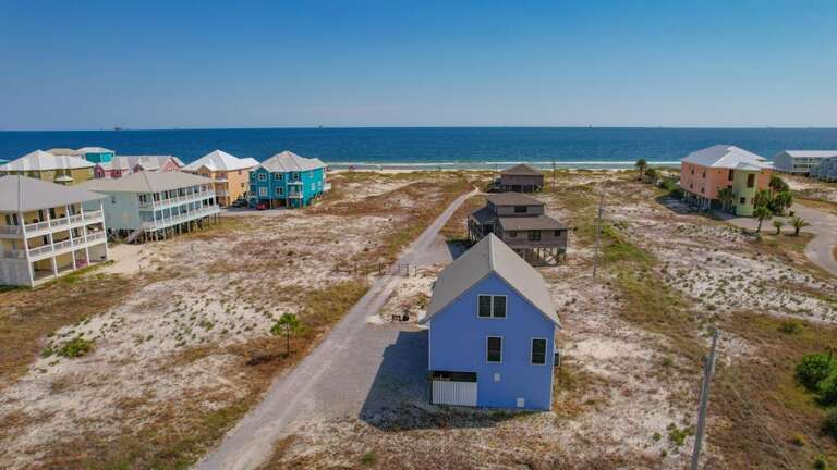 Seaside Structures Spaced Beside Sandy Shores